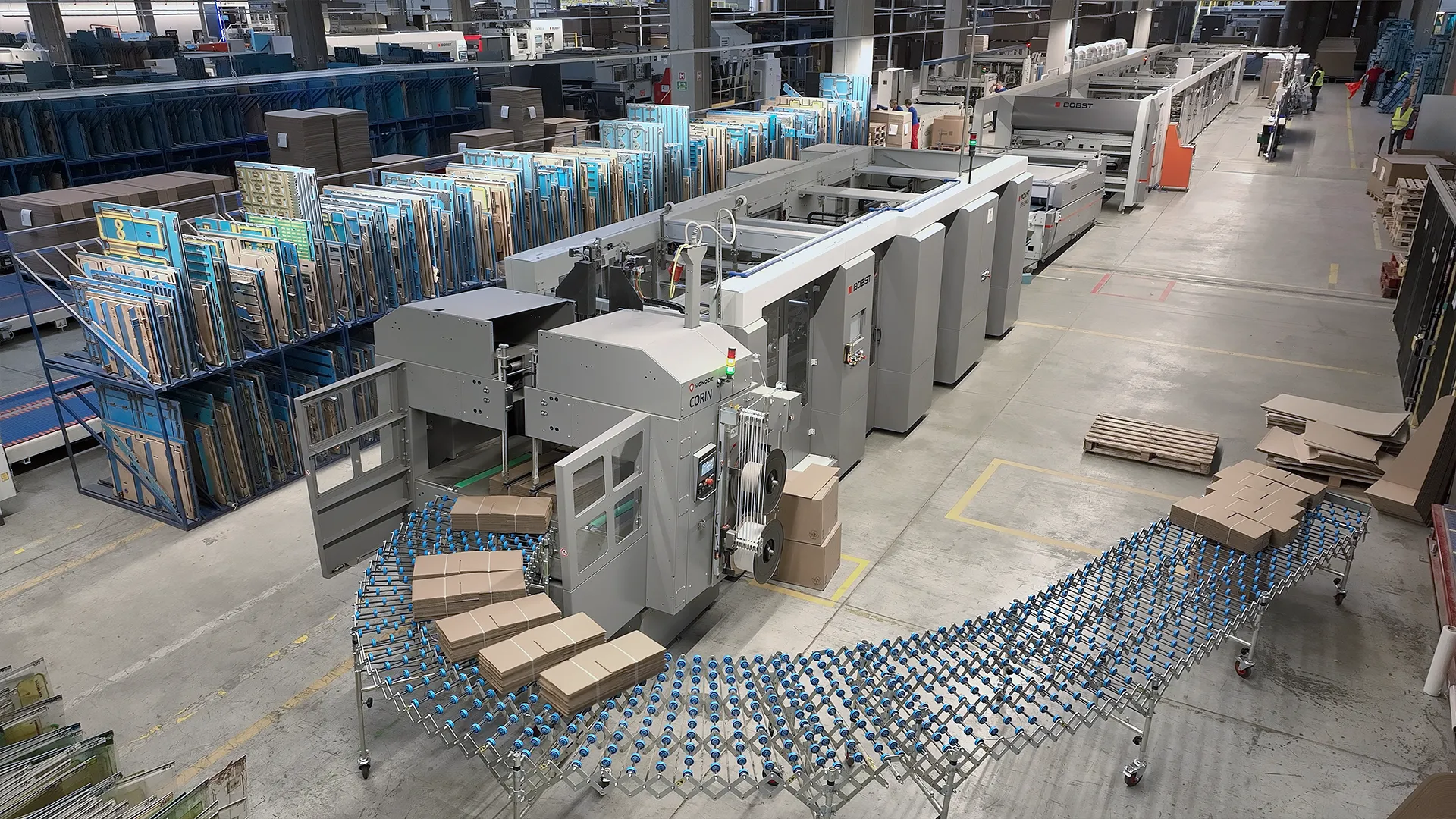 High-angle view of the folding-gluing department at THIMM's Sibiu plant with BOBST lines